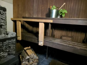 Home hubane puuküttega saun atsikivi puhketalu saunamajas